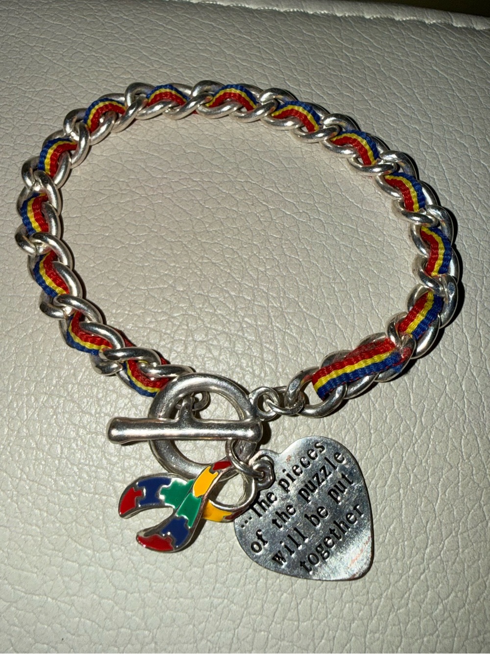 Silver-Tone Puzzle Ribbon Charm Bracelet with Multicolor Cord